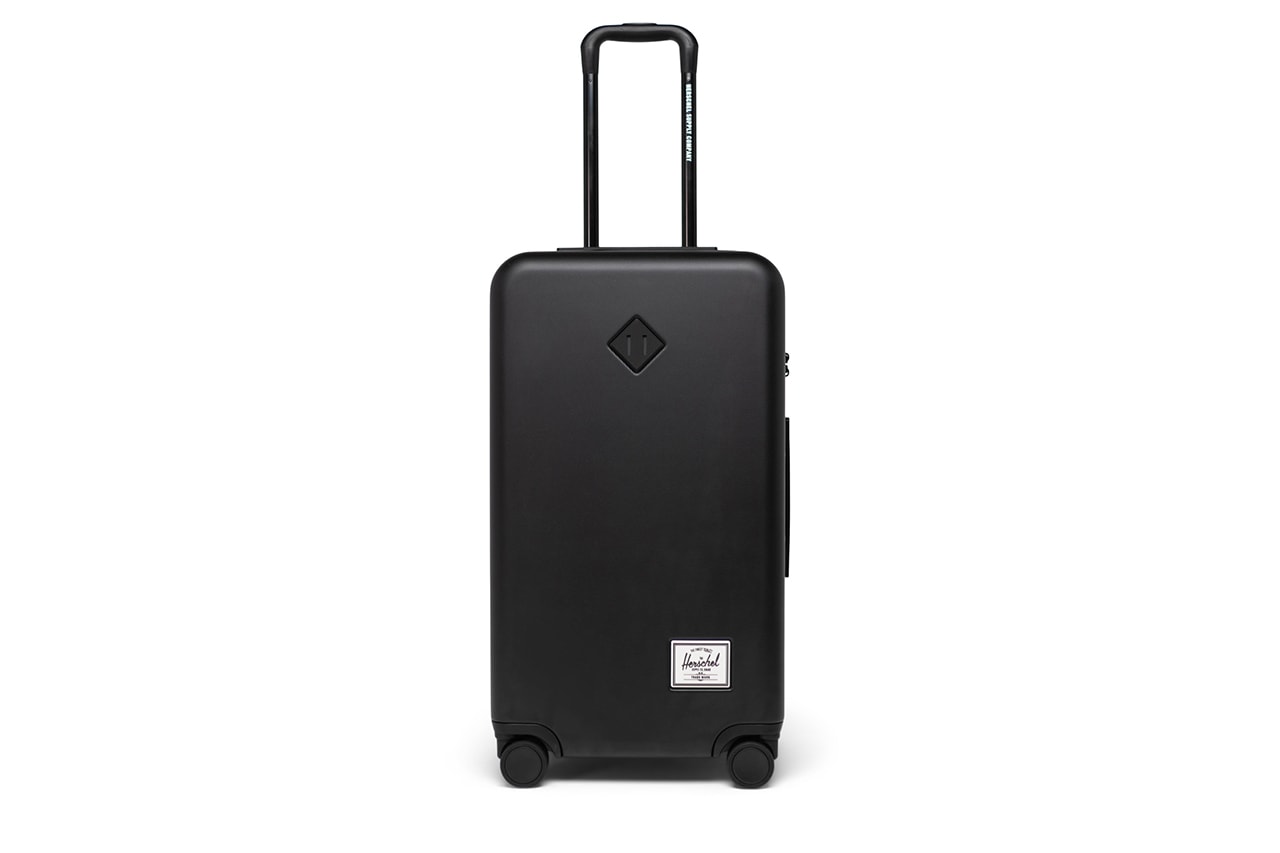 Herschel Releases Heritage Inspired Luggage Capsule carry on trunk suitcase black pink yellow blue gray