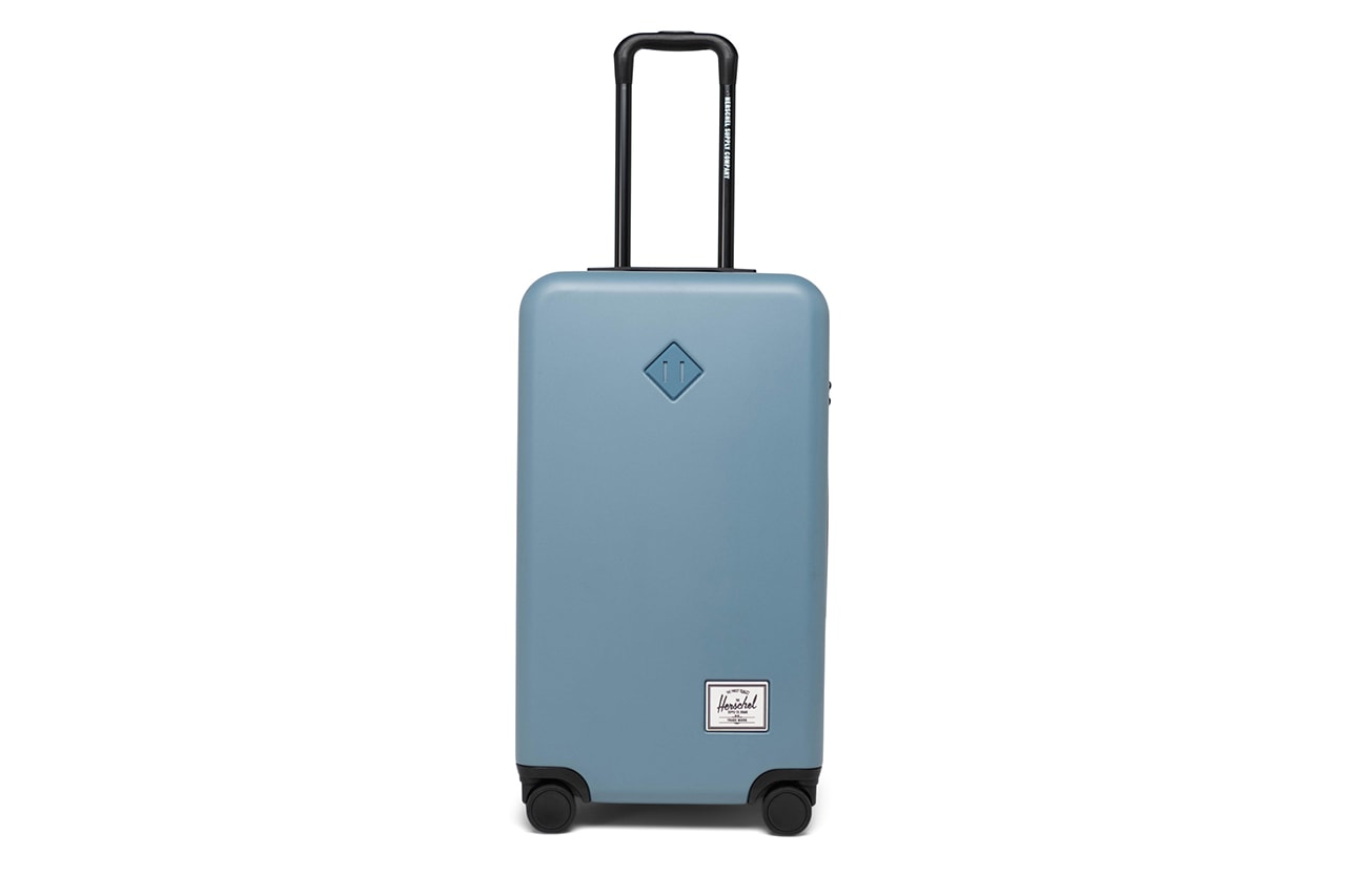 Herschel Releases Heritage Inspired Luggage Capsule carry on trunk suitcase black pink yellow blue gray