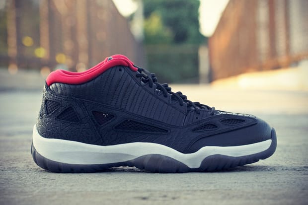 jordan 11 retro low ie black varsity red