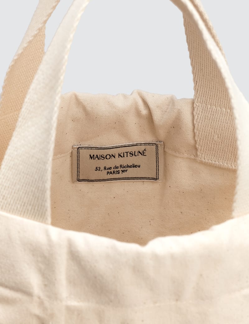 tote backpack resting fox