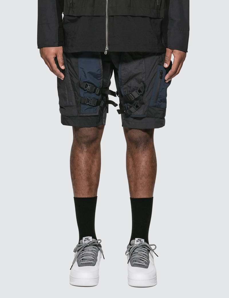 Image of White Mountaineering Mixed Short Pants
