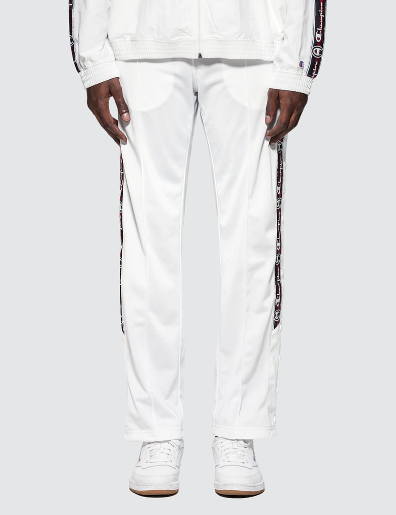 champion reverse weave popper taped track pant