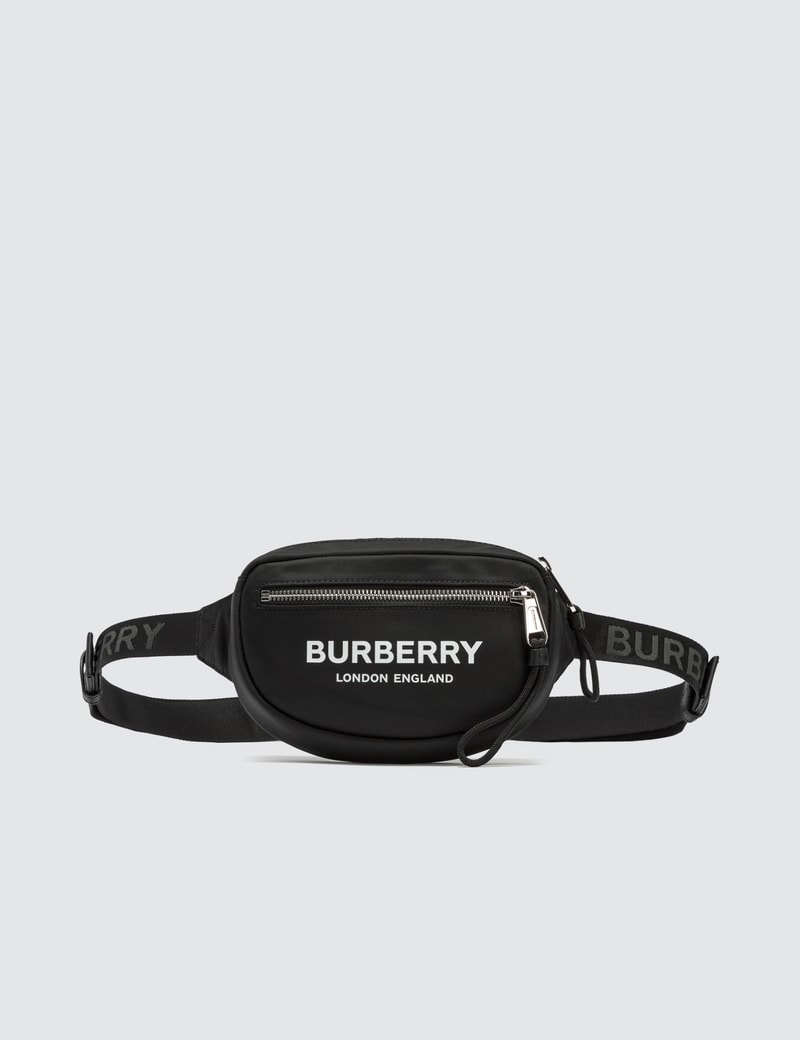Click to view more detailed imagery on our partner's website Burberry Small Logo Print Econyl® Cannon Bum Bag In Black