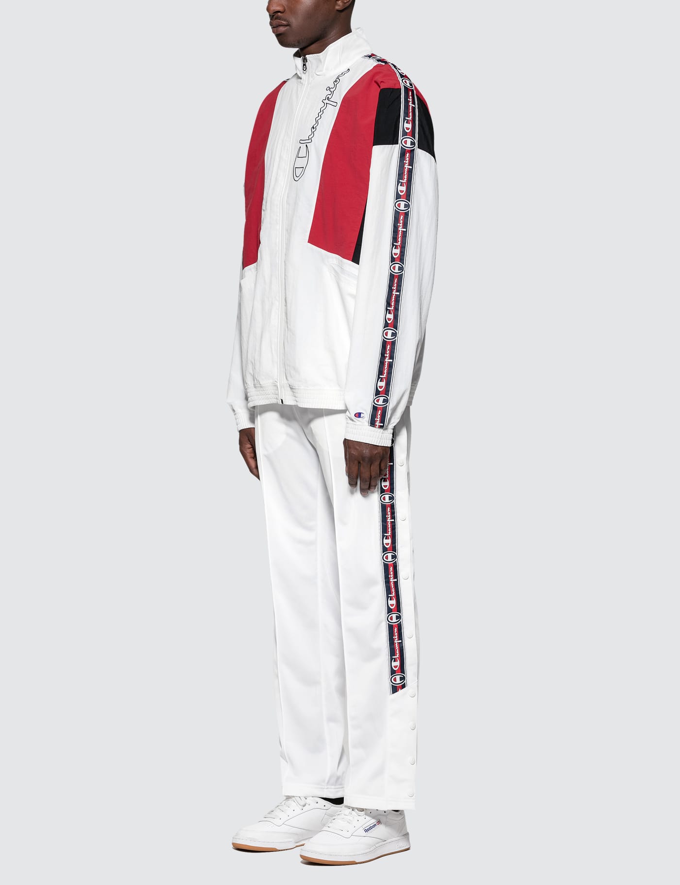 champion reverse weave popper taped track pant