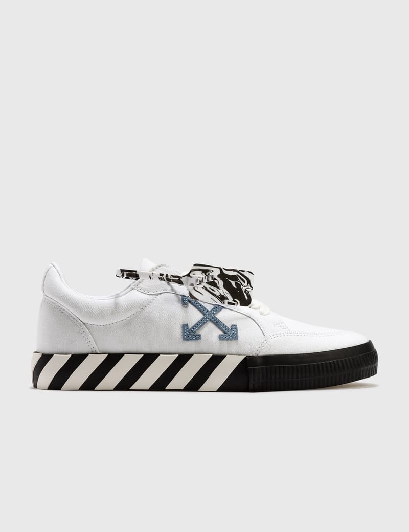 off white low vulcanised canvas shoes