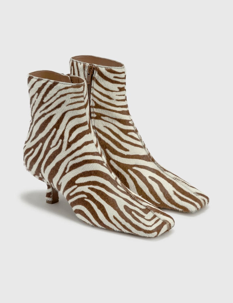 Image of BY FAR Lange Zebrina Beige Leather Boots