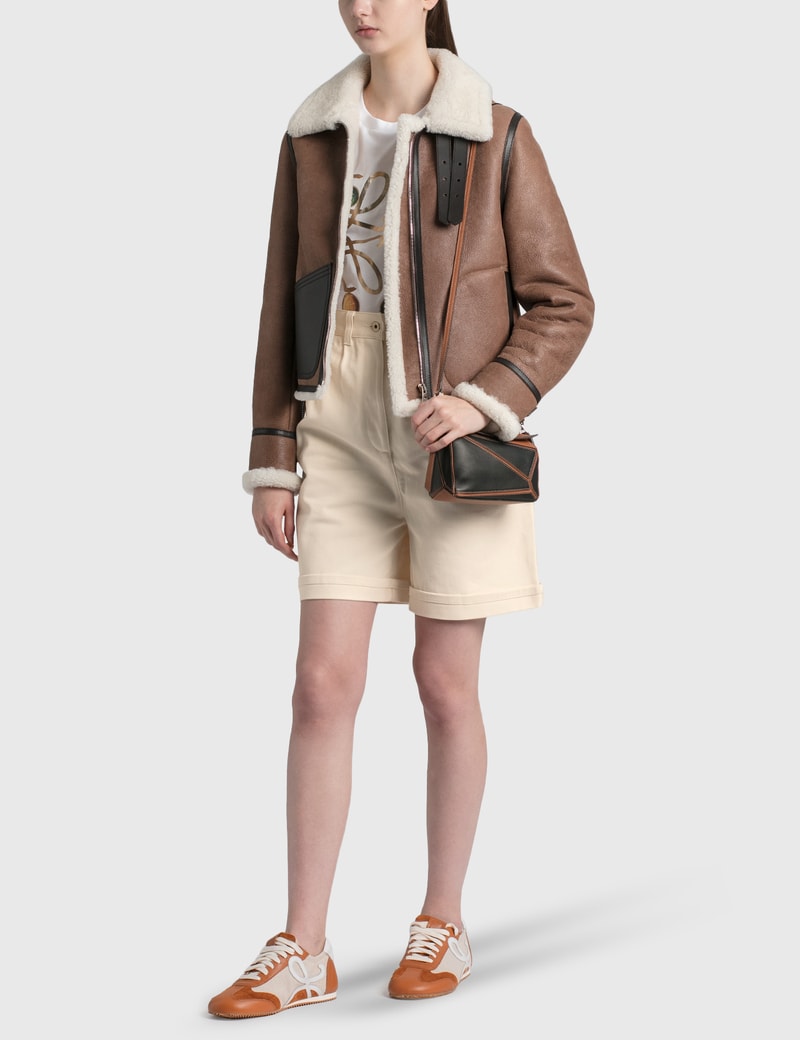Click to view more detailed imagery on our partner's website Loewe Mini Puzzle Bag In Black