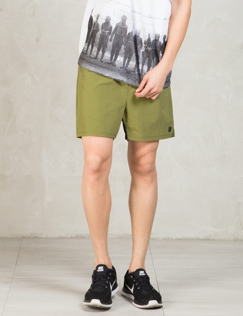 olive running shorts