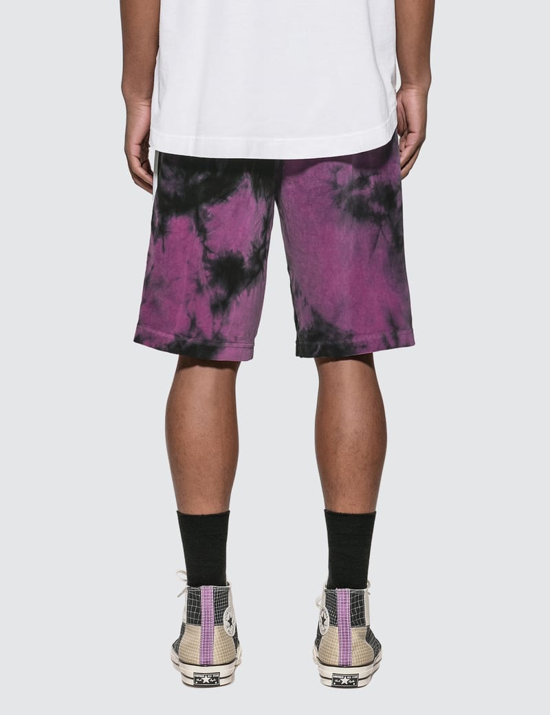 purple track shorts