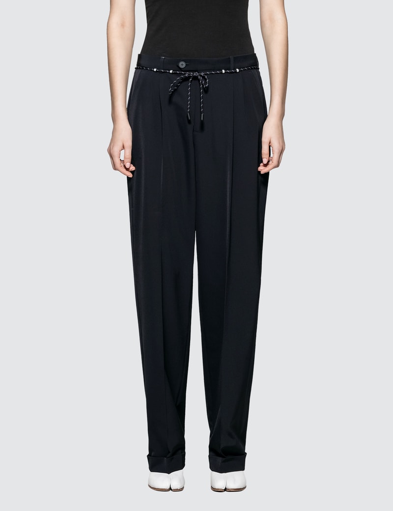 Image of Maison Margiela Pleated Stretch-Canvas Pants