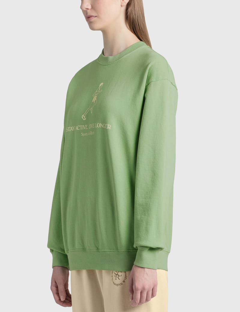sporty and rich green sweatshirt