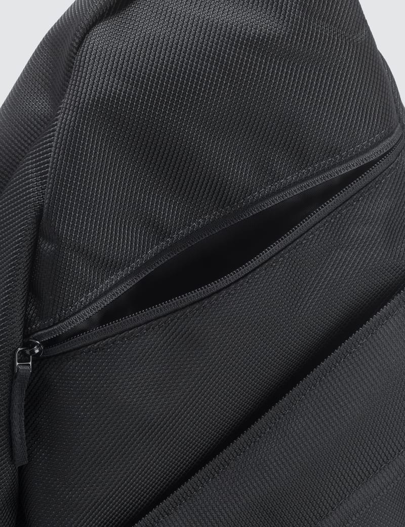 raf simons sling backpack