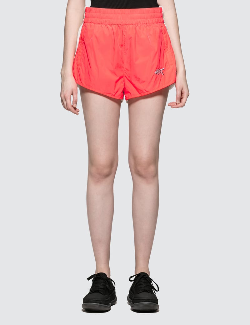 orange nylon shorts