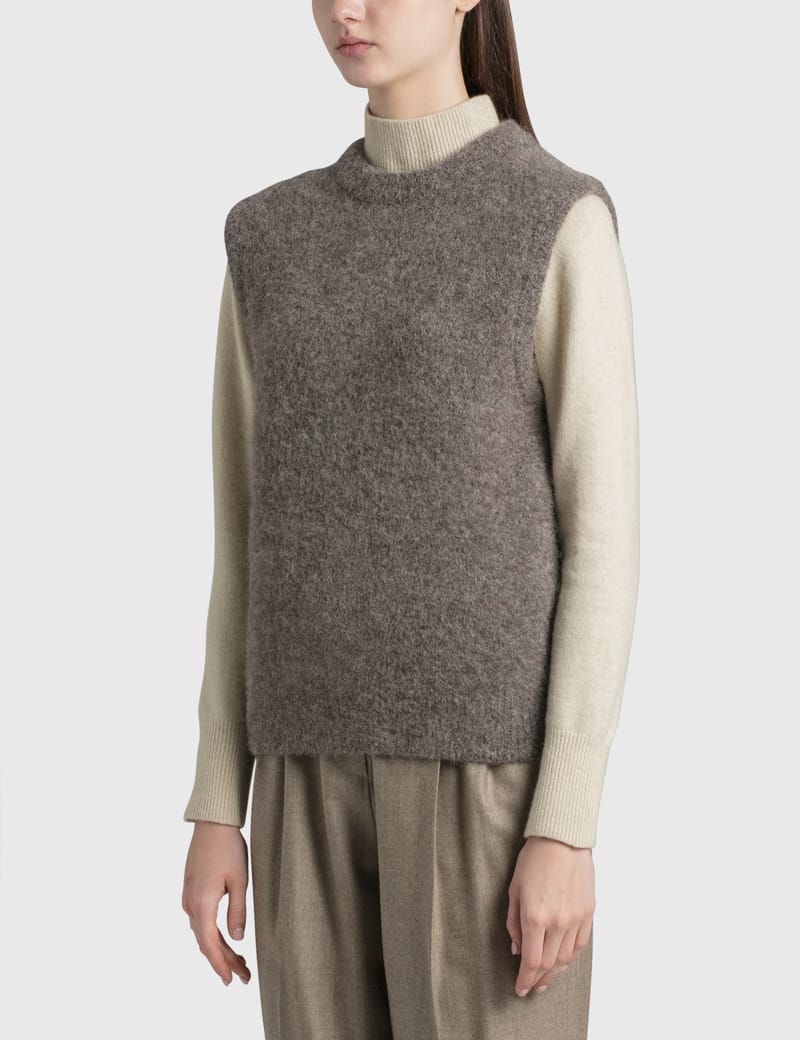 brown sweater vest