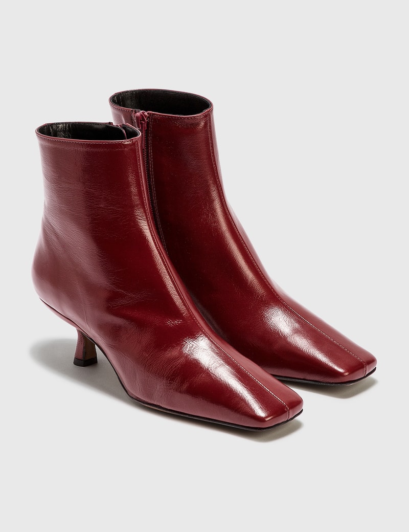 Image of BY FAR Lange Bordeaux Creased Leather Boots
