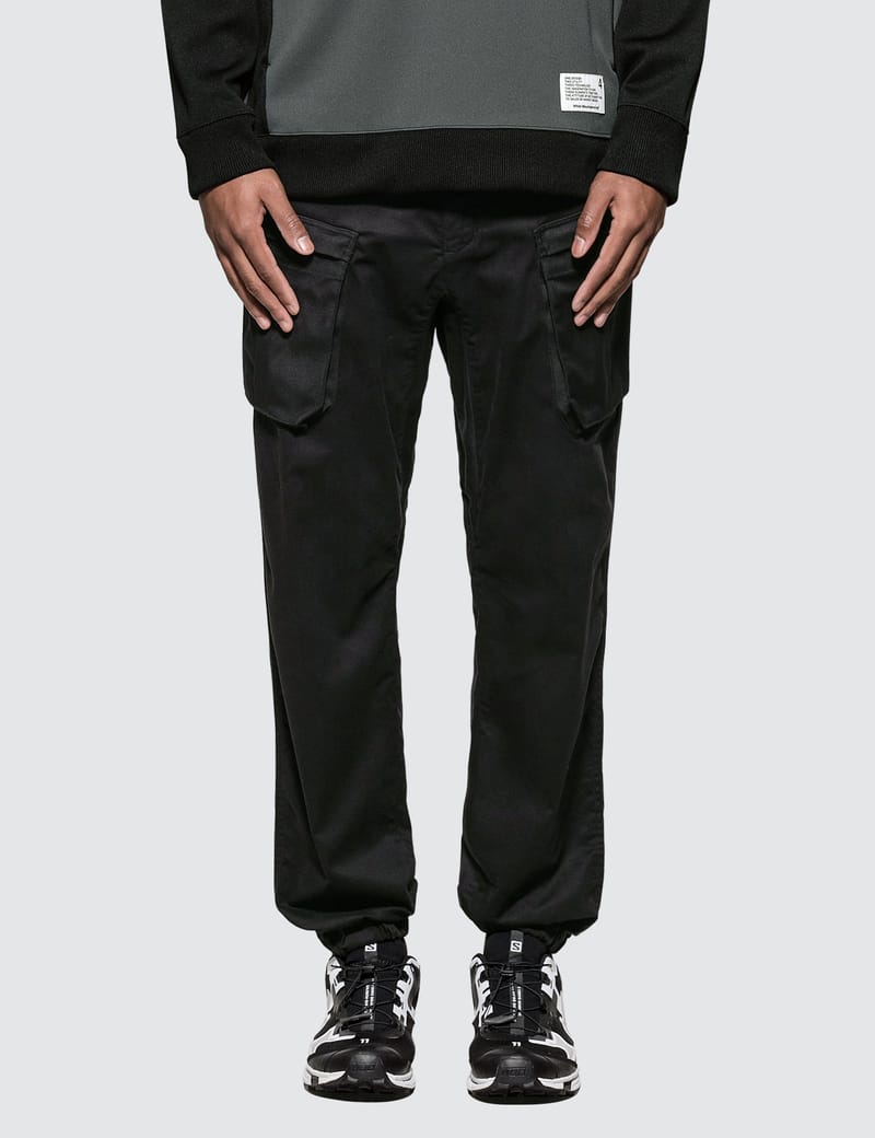 white mountaineering cargo pants