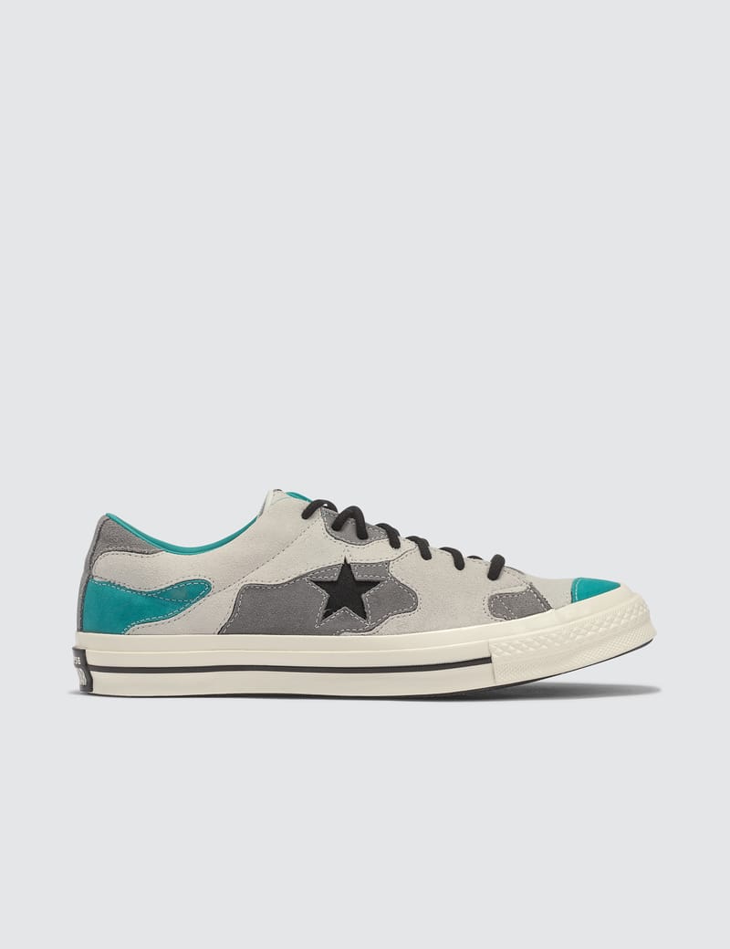 converse one star camo suede