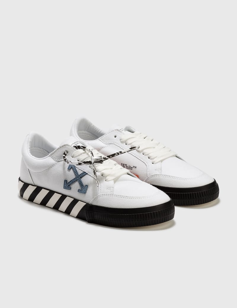 off white low vulcanised canvas shoes