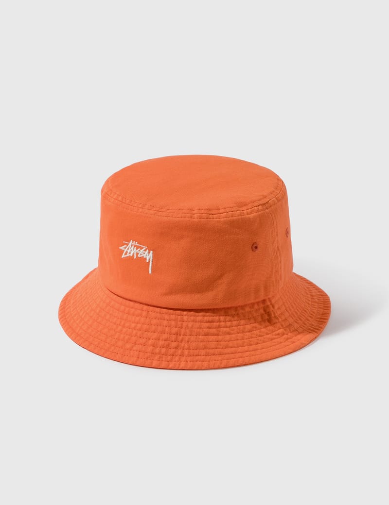 orange stussy bucket hat