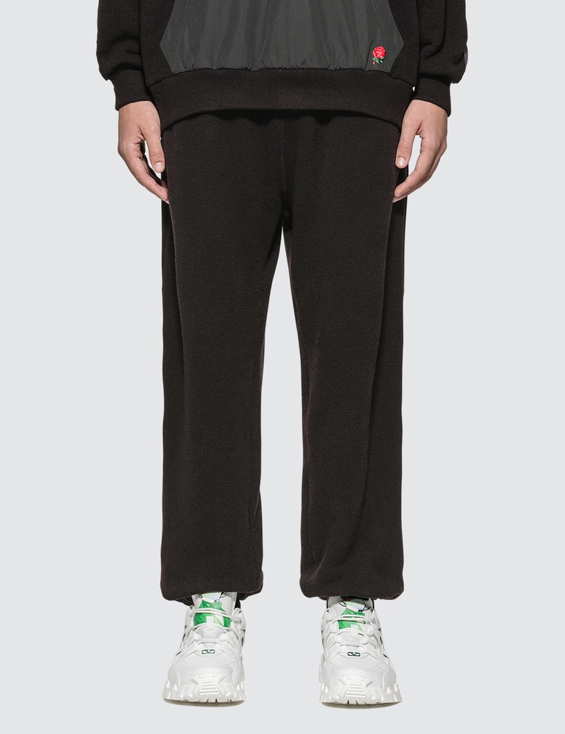 Image of Undercover Nylon-Panelled Embroidered Rose Print Pants