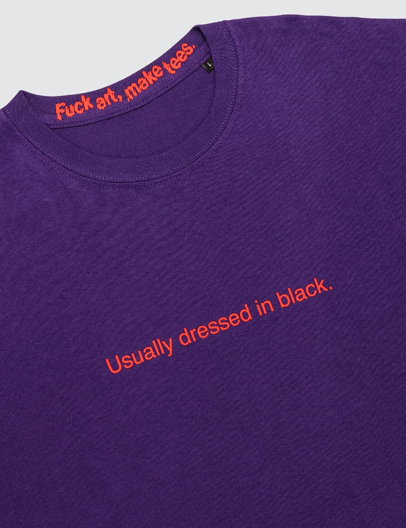 usually dressed in black tee