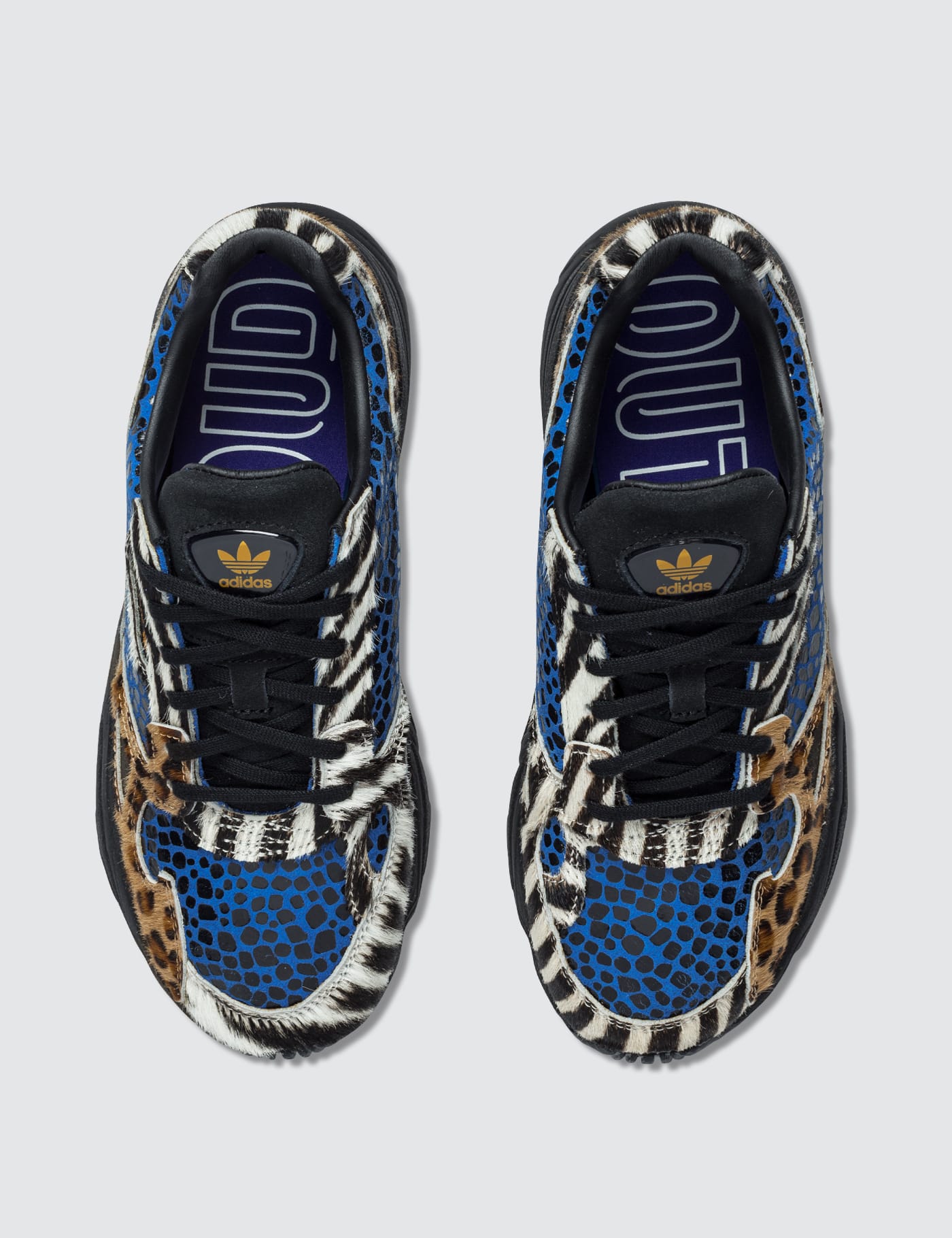adidas originals falcon trainers in contrast leopard prints