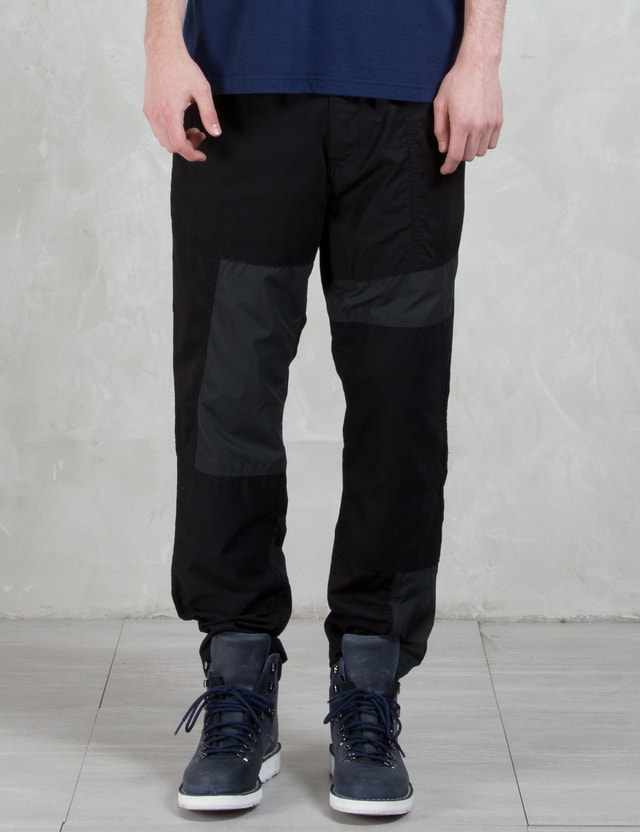 white mountaineering cargo pants