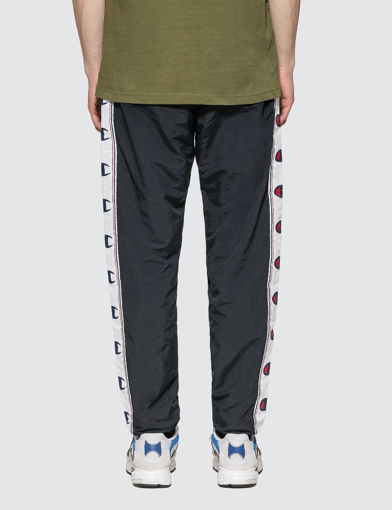 champion reverse weave corporate taped track pant