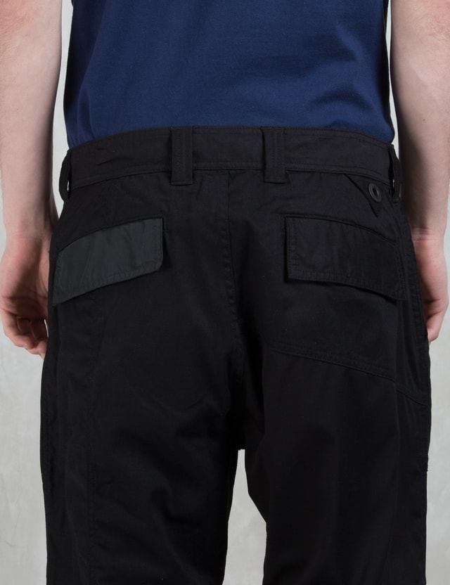 white mountaineering cargo pants