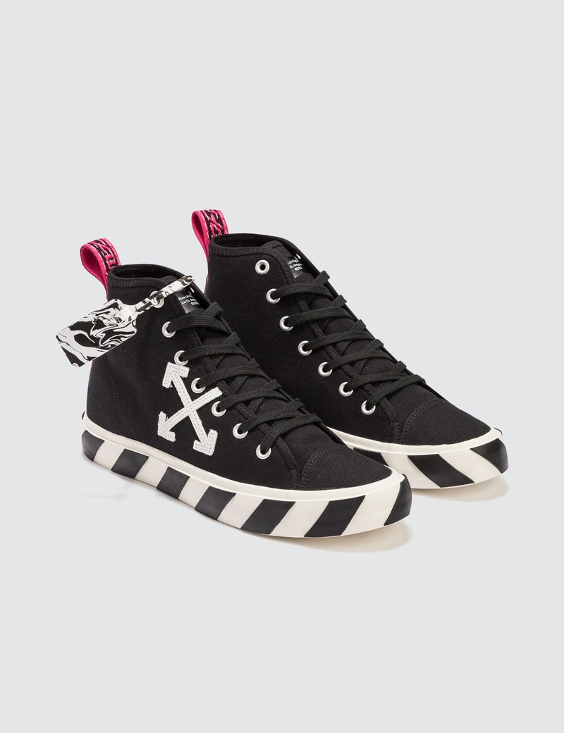 off white mid top vulcanized sneaker