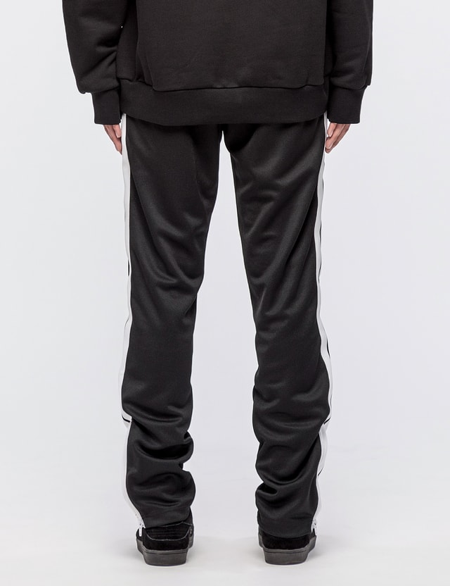 palm angels track pants cuffed