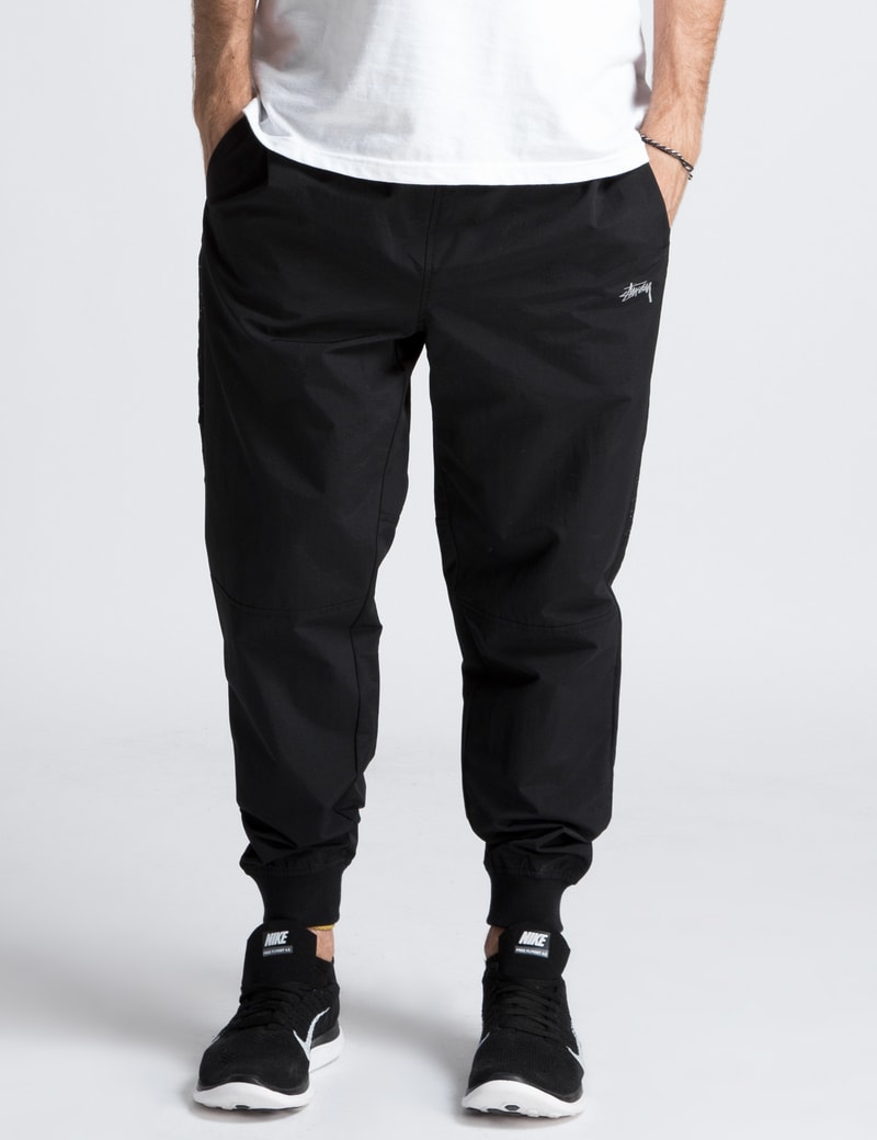 stussy track pants womens