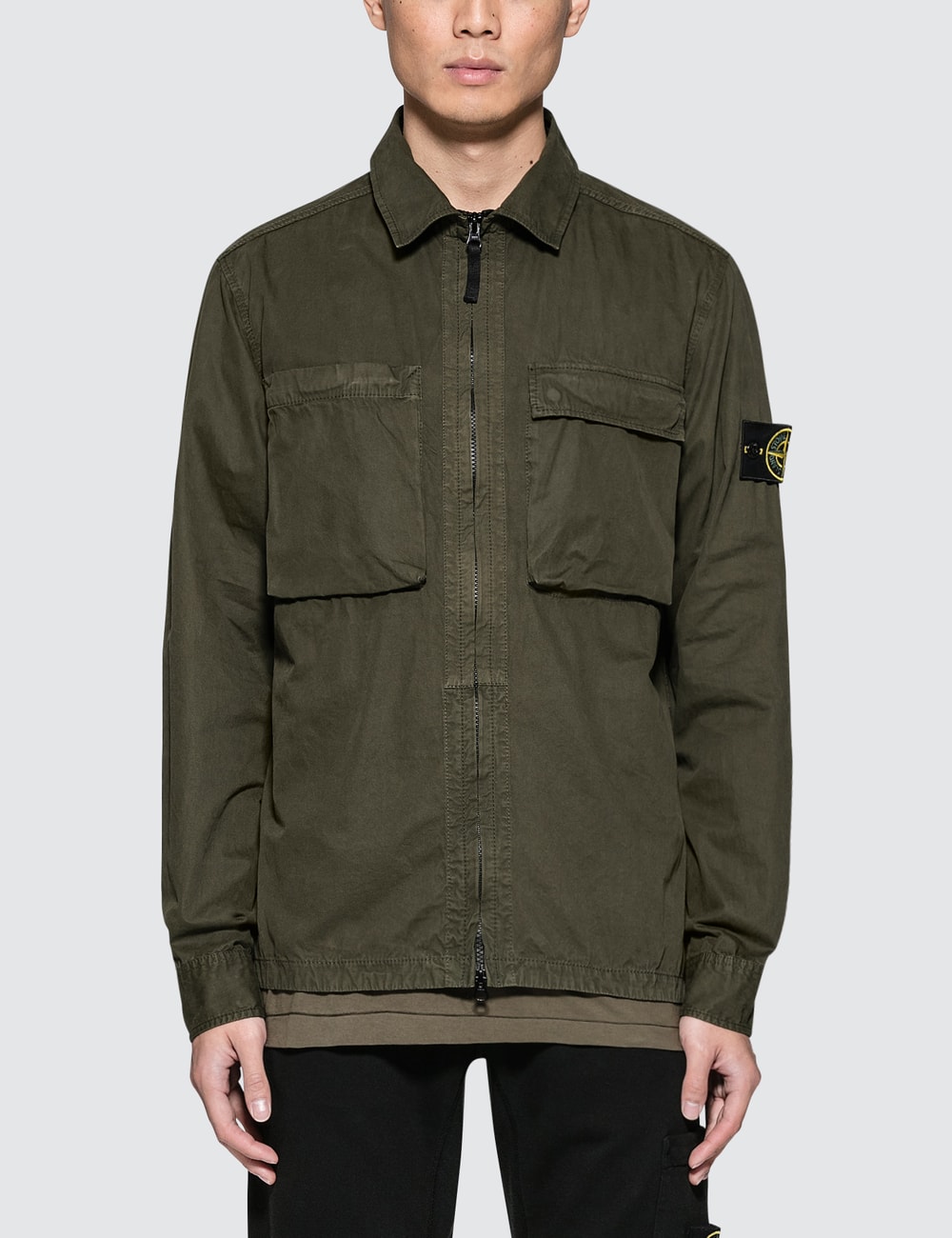 green stone island shirt