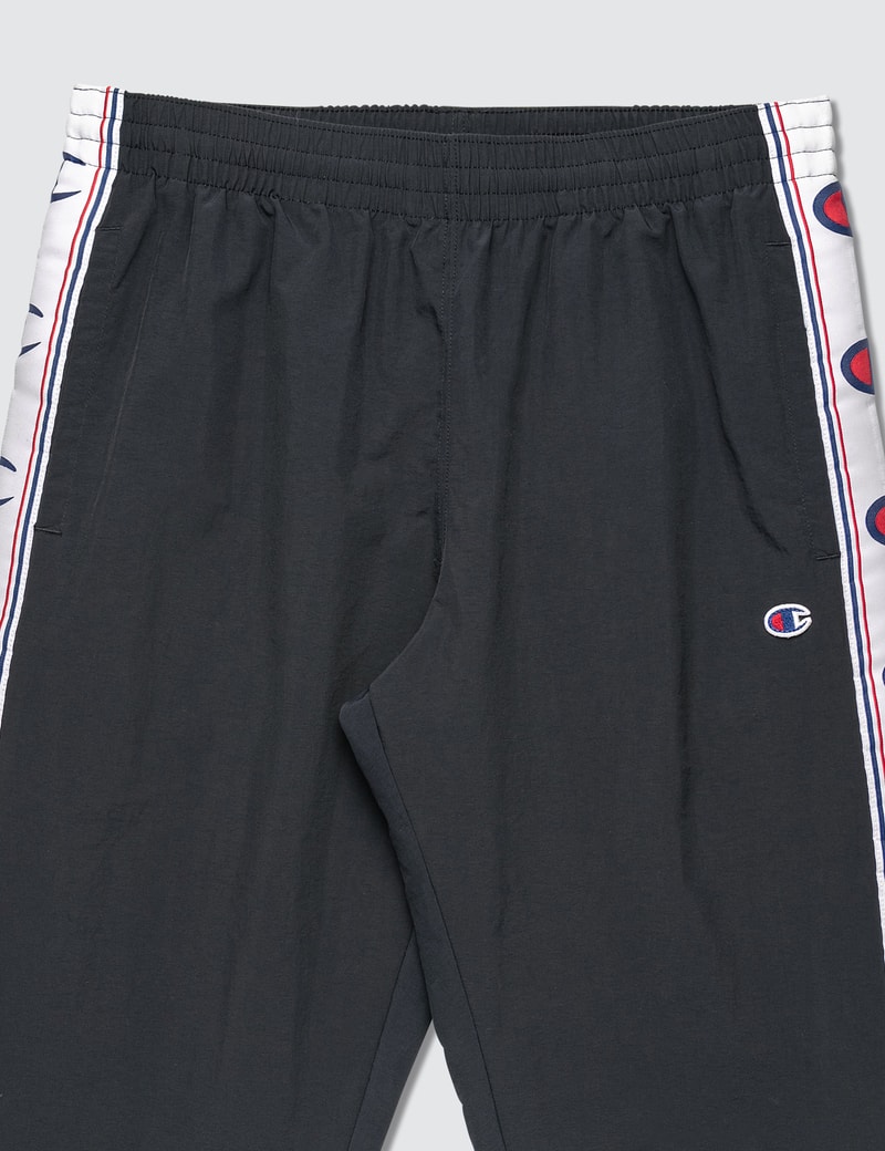 champion reverse weave taped track pant