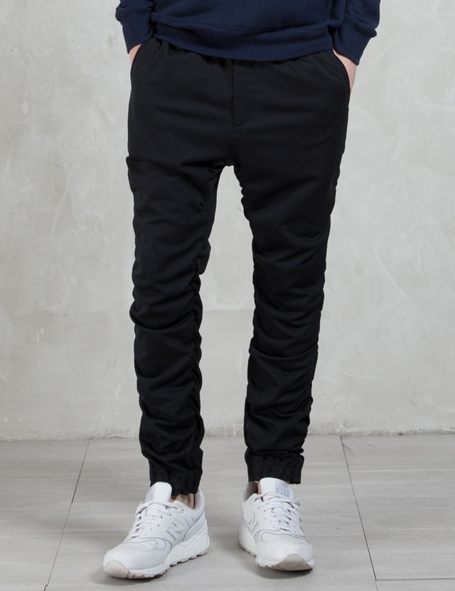 white mountaineering cargo pants