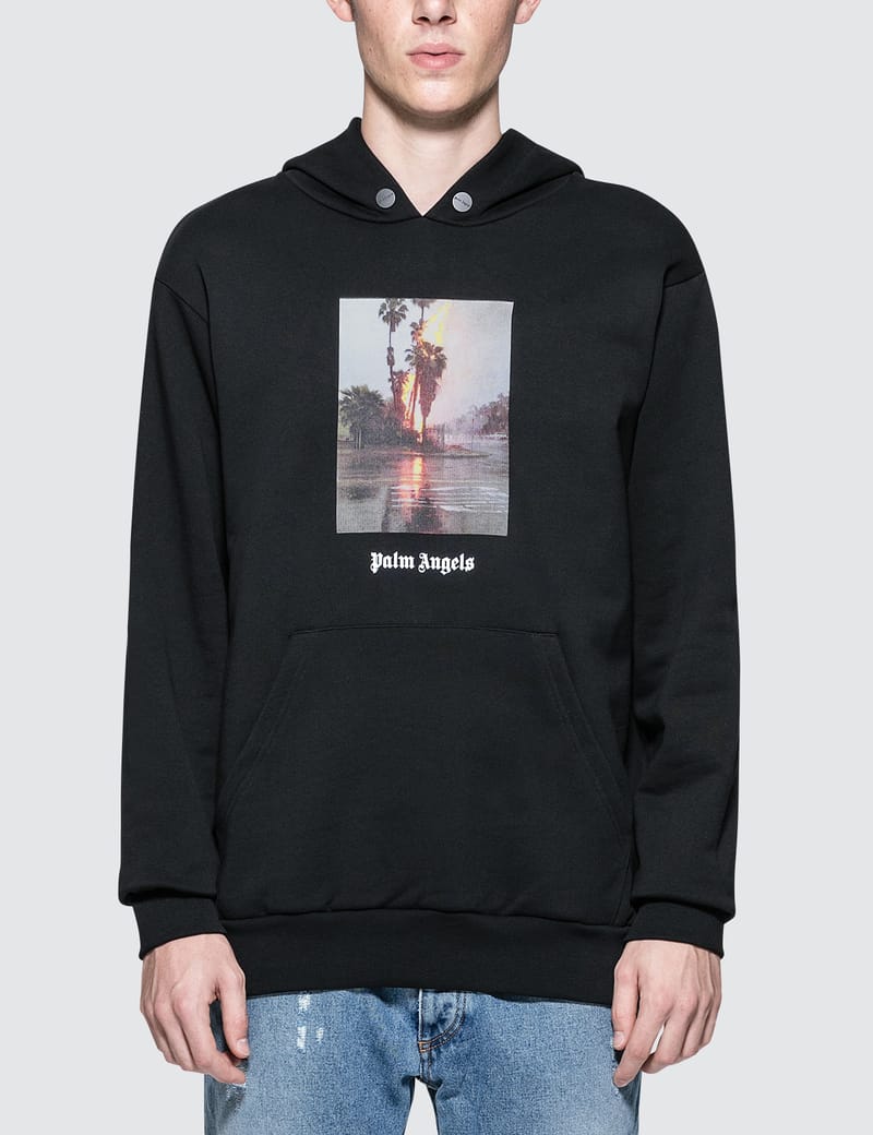 【国内発】 Palm Angels / Burning Palm Tree Logo Hoodie Palm Angels Burning Palm Cotton Hoodie | Black | FARFETCH