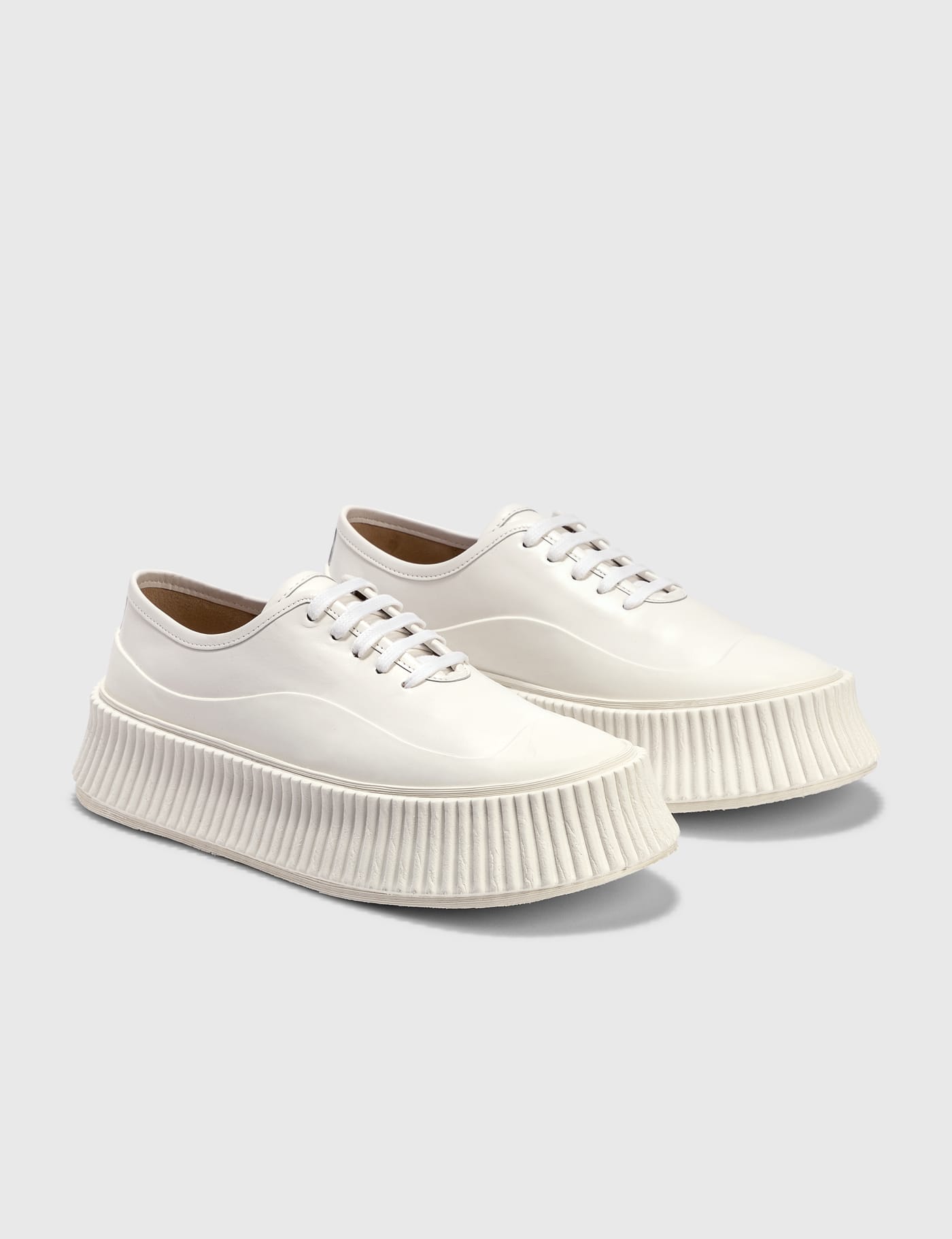 Jil Sander - Padded Low-top Leather Sneaker | HBX - Globally Curated  Fashion and Lifestyle by Hypebeast