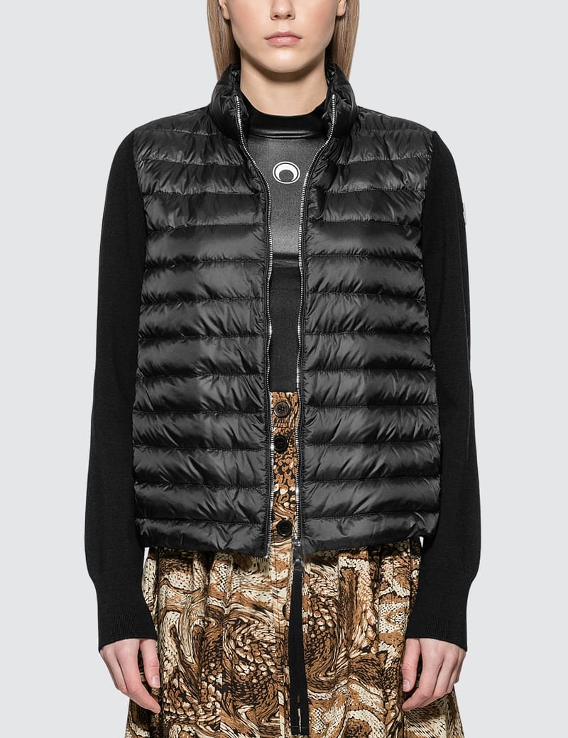 Down jacket with outlet knit sleeves