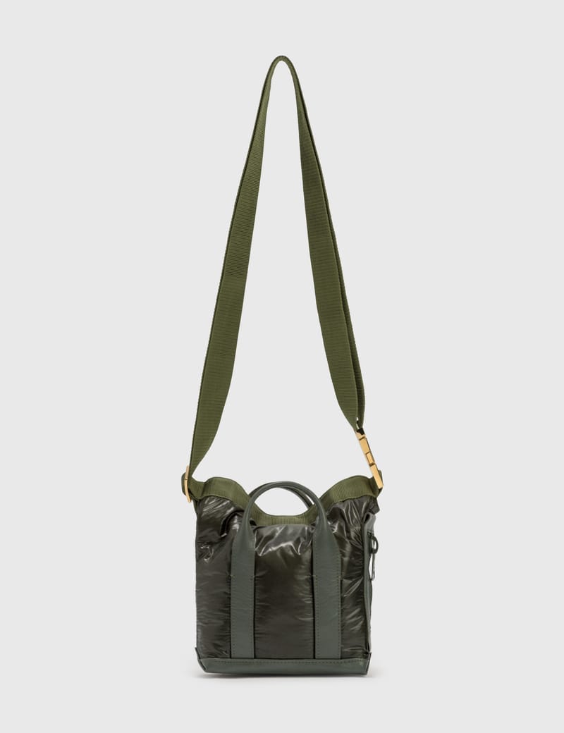 Sacai Micro Dry Bag In Green | ModeSens