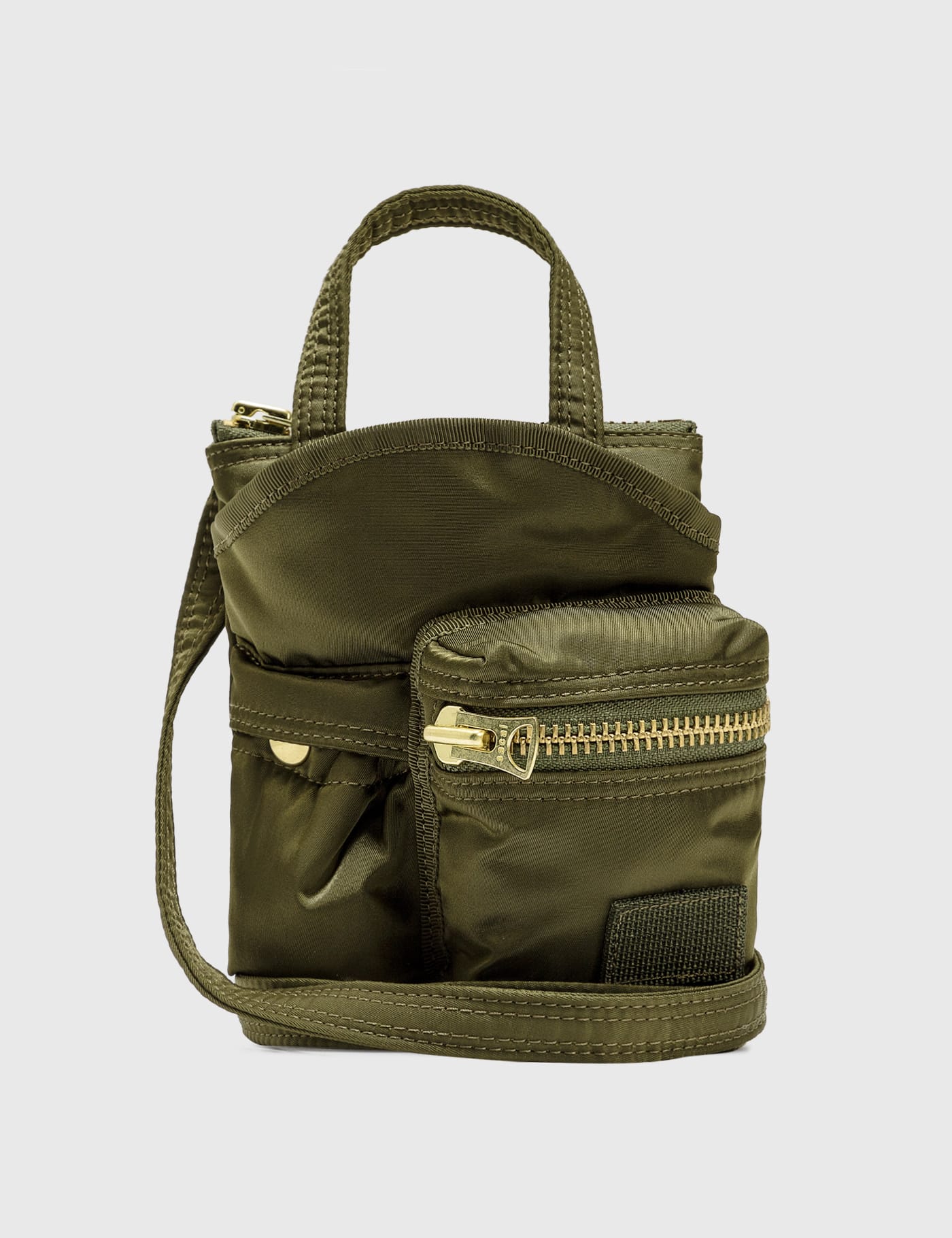Sacai - Porter Pocket Bag Small | HBX - HYPEBEAST 為您搜羅全球潮流時尚品牌