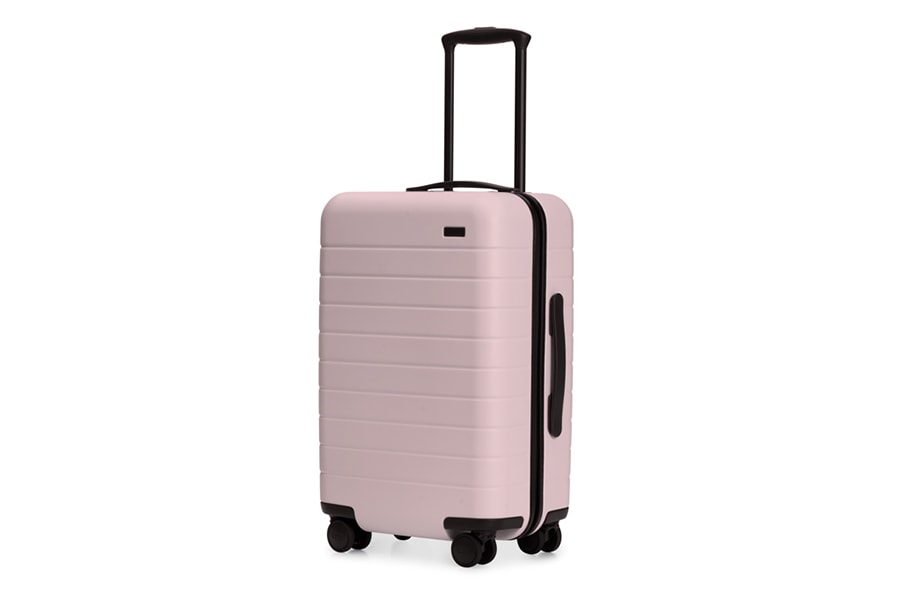Pop and Suki Waterhouse Pink Suitcase Away