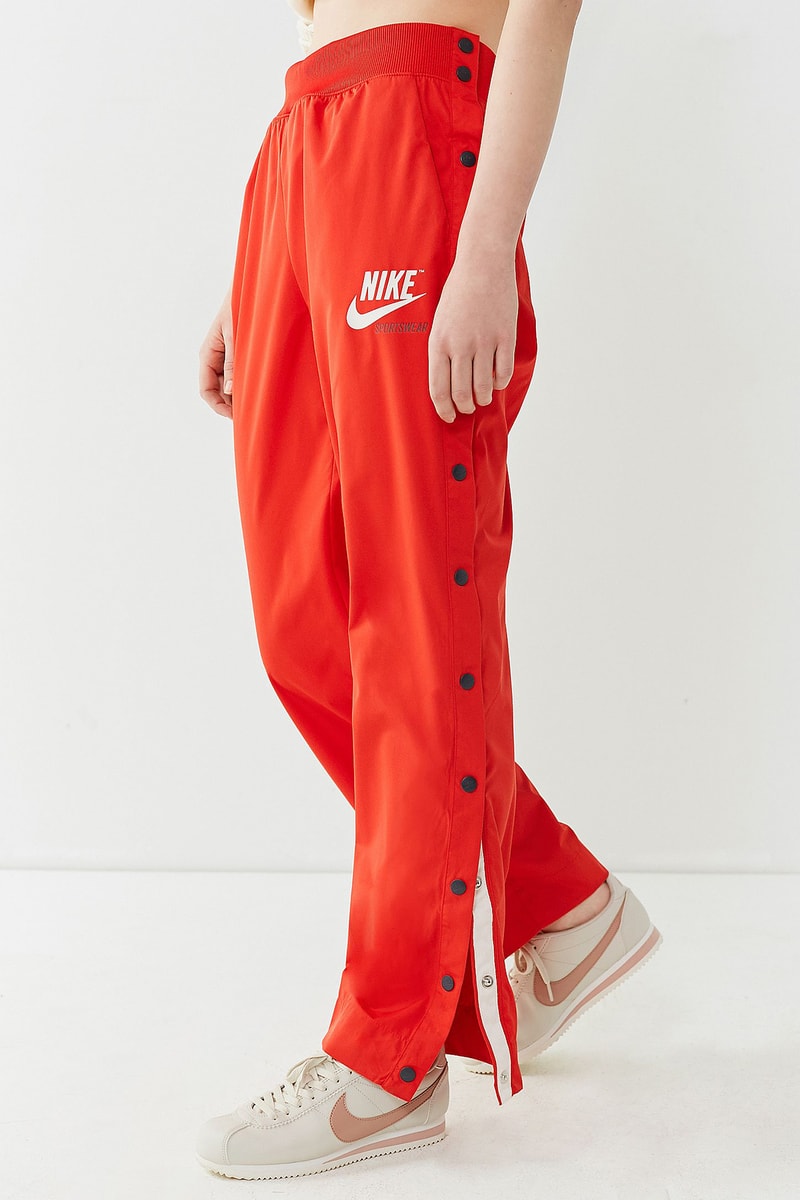 nike red track pants tear away popper vintage retro sporty womens urban outfitters