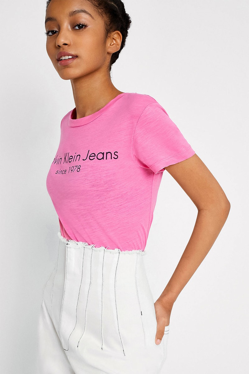 Calvin Klein minimal retro 90s pink logo t shirt cotton womens tee urban outfitters where to buy