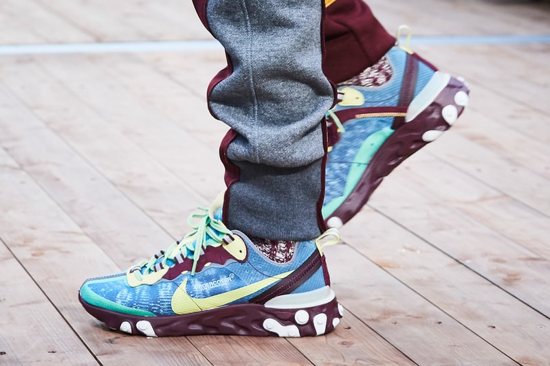 Undercover x Nike React Element 87 Sadie Sink Paris Fashion Week Maroon Blue Yellow