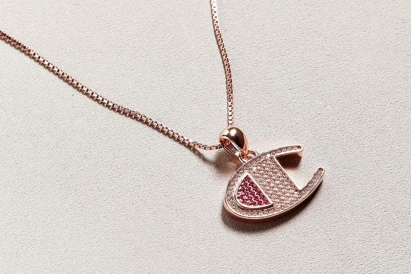 Step up Your Jewelry Game With Champion's Blingy Logo Necklaces