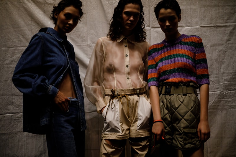 GANNI Copenhagen Fashion Week Backstage Spring Summer 2019 SS19 Denim Jacket Pants Blue Sheer Shirt Tan Striped Top Navy Red