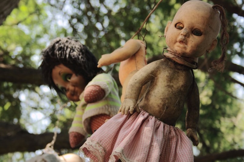 Most Haunted PLaces in the World USA Singapore Japan Okinawa Islands of Dolls Mexico Isla De Las Munecas Eastern State Penitentiary Stanley Hotel Chicago Steven King The Shining Visit Haunted Places Spooky Scary WW2 Stories Ghosts