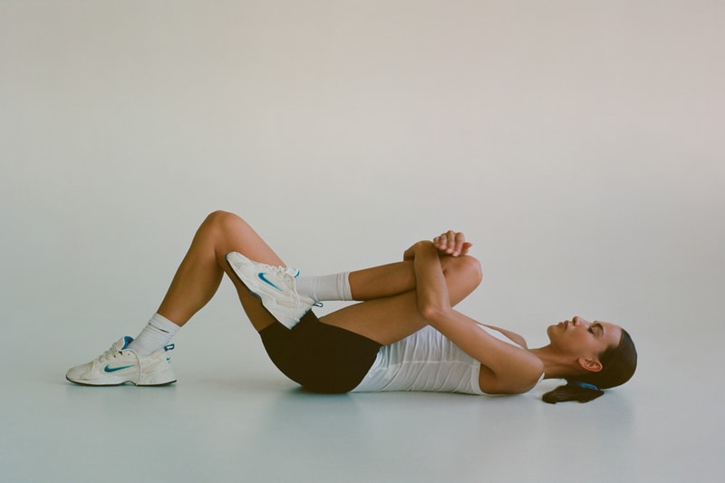 Bandier Campaign Emily Oberg Top White Shorts Black Nike Sneakers White