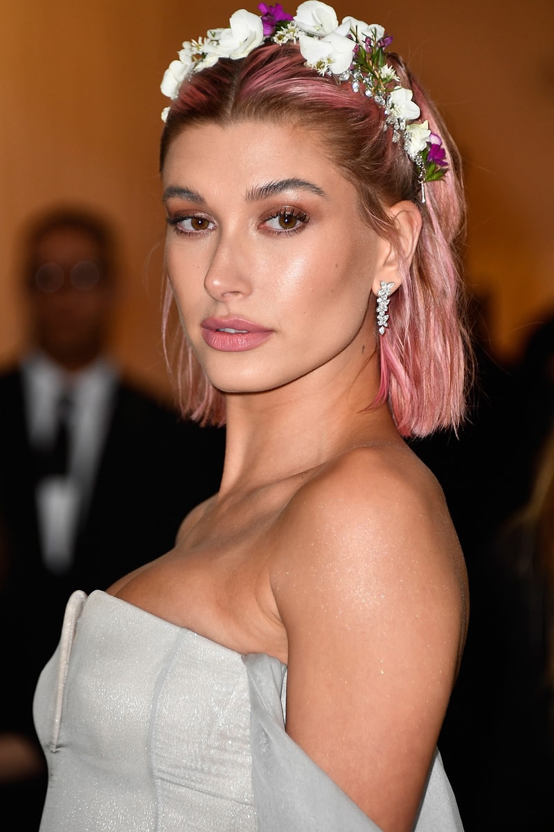 Hailey Baldwin Met Gala 2018 Red Carpet Beauty Pink Hair Flower Grown Makeup Heavenly Bodies Fashion Catholic Imagination Costume Institute Metropolitan Museum of Art