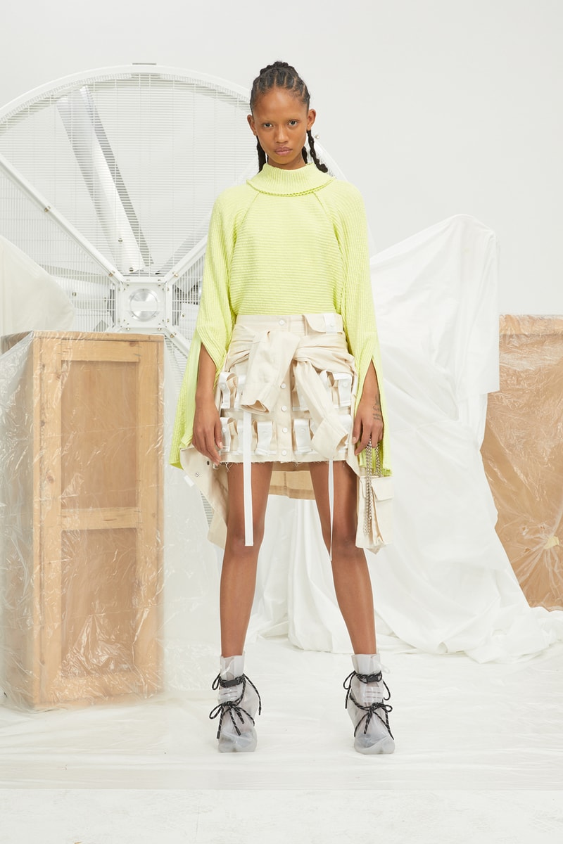 perfect number woman on pedastal Adesuwa Aighewi yellow shirt white skirt